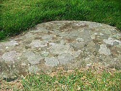 A stone with cup marks