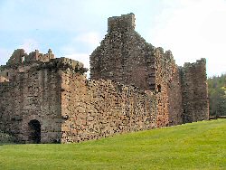 The accommodation block and courtyard wall