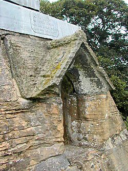 One of the windows of the spital staircase, with a plaque detailing the lead roofers.