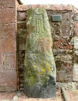 The stone mounted outside the church