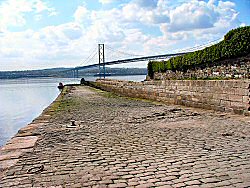 The Town Pier, with the Forth Road bridge in the distance
